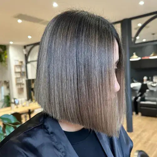 classic blunt bob haircut with babylights salon Toujours Belle